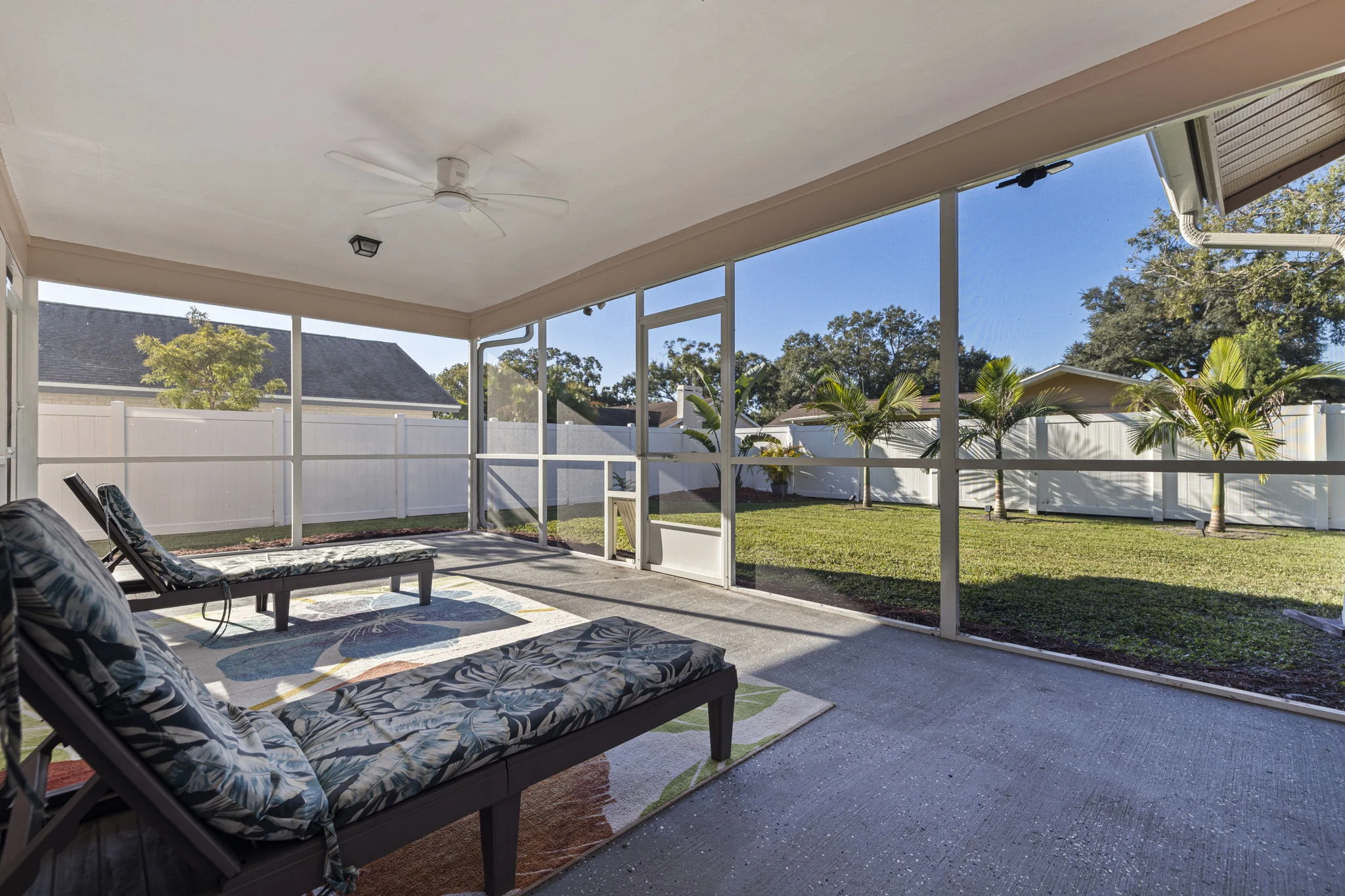 Screened patio overlooking the backyard